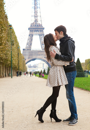 Young romantic couple kissing