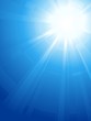 Blue sky with glaring sun