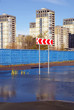 Sign of detour at a fence