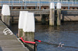 Jetty with wooden bollards in a Dutch harbor