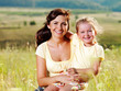 Young happy family on nature