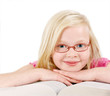 A cute little blond girl dreaming