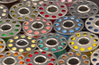 Photo: Colorful spools of yarn in a close-up Colorful spools of yarn in a close-up
