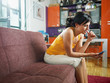 nervous woman holding cellphone