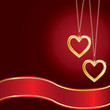 Golden hearts on a red background with red ribbon Golden hearts on a red background with red ribbon