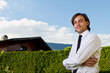 Young realtor with blue skies