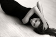 Attractive girl lying on the floor of the wood Attractive girl lying on the floor of the wood