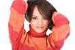 cute brunette in a red-orange wool sweater, isolated on white