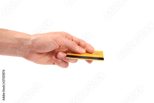 Photo: hand gives credit card hand gives credit card