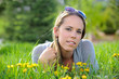 Photo: Young Woman Lying in Grass Young Woman Lying in Grass