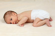 One month old baby girl on soft blanket