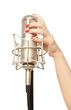 Woman's hand with red nails holding microphone