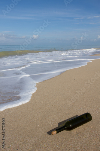 Photo: A bottle on beach A bottle on beach