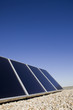 Solar panels on the roof against blue sky