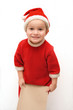 Funny kid dressed as Santa Claus is waiting for New Year Funny kid dressed as Santa Claus is waiting for New Year