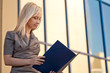 Beautiful woman sitting outdoors Beautiful woman sitting outdoors