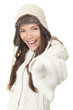 Winter woman pointing