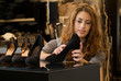 Woman looking at shoes in a shop
