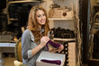 Woman trying out shoes in a shop