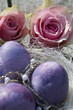 Easter eggs in purple with two roses