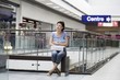 Young woman sits in new Voronezh shopping centre
