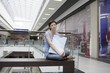 Young woman sits in new Voronezh shopping centre