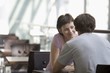 Young couple sit in food hall of shopping mall, Voronezh