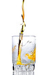 Whisky,rum or any other golden liquor being poured into a glass