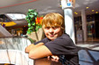 smiling boy inside a center