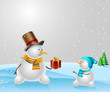 Snowmen with Christmas present on natural background.