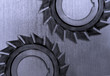 Industrial metal scratched with gears
