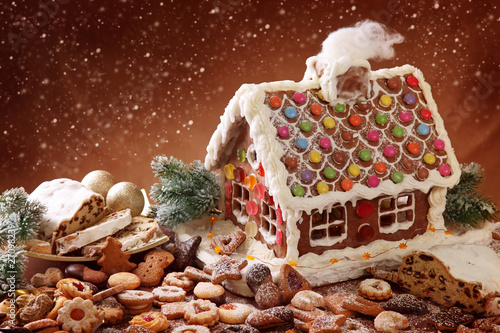 Photo: Homemade gingerbread house and christmas cakes Homemade gingerbread house and christmas cakes