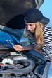 Young Blond Woman With Her Broken Car Young Blond Woman With Her Broken Car