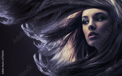 Photo: Beautiful lady with long brown hair, at moonlight Beautiful lady with long brown hair, at moonlight