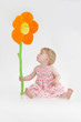 Infant with plushy toy