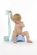 Photo: Child with toilet roll. Child with toilet roll.
