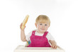Infant with roll.