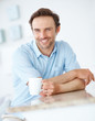 Happy young man with cup of coffee Happy young man with cup of coffee