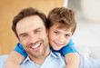 Closeup portrait of a happy father and son together
