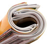 rolled up magazine on white rolled up magazine on white