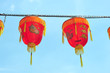 Two Red Silk Lanterns Against Clear Blue Sky Two Red Silk Lanterns Against Clear Blue Sky