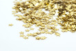 close up of confetti on white background close up of confetti on white background