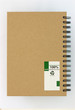 Recycle paper notebook back cover on white background