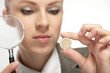 portrait of young businesswoman with magnifying glass portrait of young businesswoman with magnifying glass