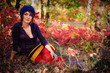 The girl in autumn wood