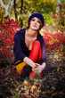 The girl in autumn wood