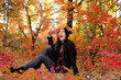 The girl brunette in autumn wood