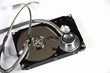 Computer hard drive and a stethoscope. Computer hard drive and a stethoscope.