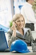 Smiling professional on phone