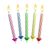 colorful lit candles isolated over white